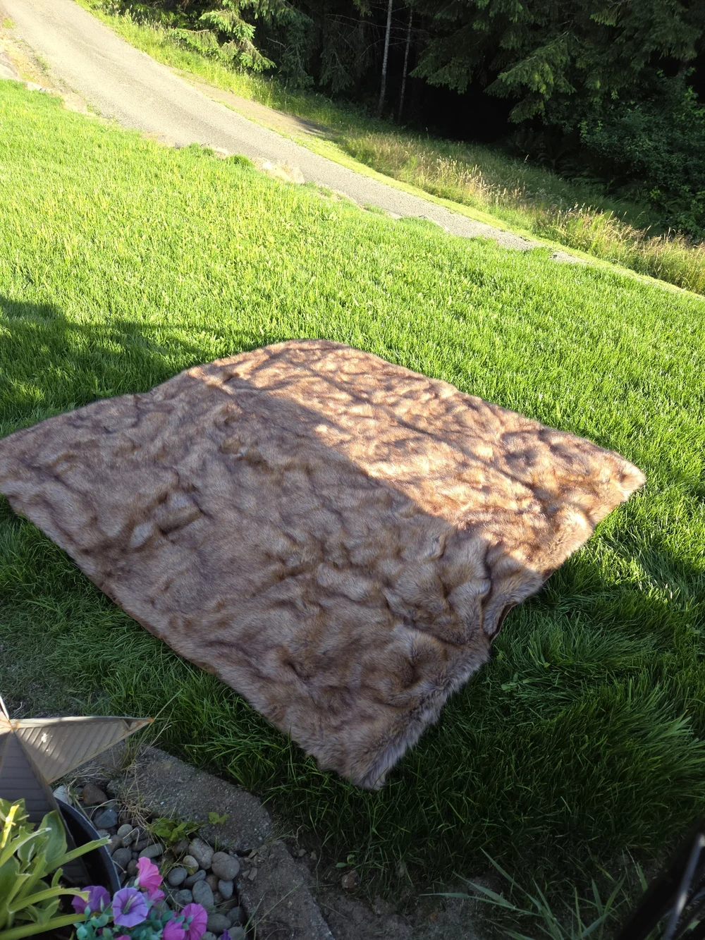 This is a brown faux fur item from the Vanity Living HOME brand.